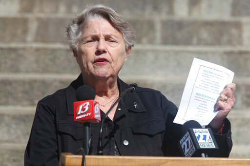 Joan Wagnon, a former Kansas Department of Revenue head and former Kansas Democratic Party chair, speaks during a news conference outside the Statehouse on Thursday, Oct. 13, 2022, in Topeka, Kan. Wagnon helped form a new group, Keep Kansas Free, that is opposing a proposed amendment to the Kansas Constitution to make it easier for legislators to overturn agencies' rules. (AP Photo/John Hanna)