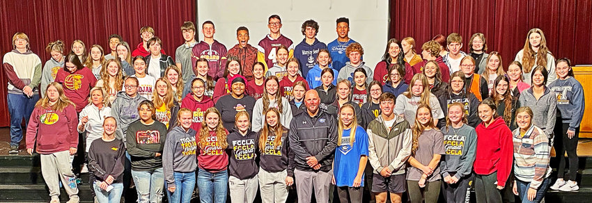 Crowder College baseball coach Travis Lallemand (front center) is named Girard High School's FCCLA Outstanding Alumni Award. Lallemand is pictured with the school's FCCLA members.
