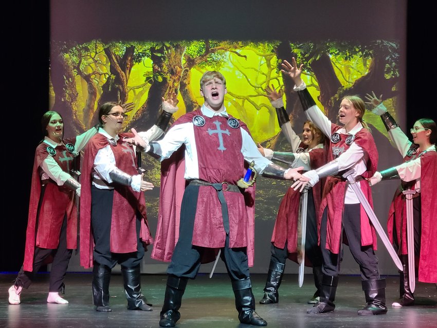 Prince Topher, played by Brayden Seiwart sings &quot;Me, Who Am I?&quot; surrounded by knights during Frontenac High School's production of Roger and Hammerstein's Cinderella, which will open this weekend.