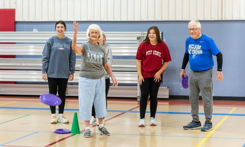 Julia Robertson, second from right, and members of the Therapeutic Interventions for Older Adults class at the Pittsburg Family YMCA.