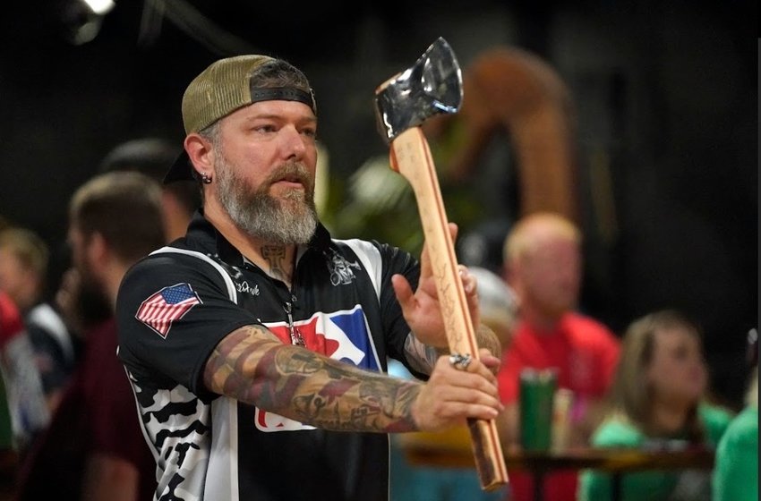 Brodi Pursley prepares to throw a big axe during competition. Axe throwing has three disciplines for competition: standard hatchet which uses a smaller axe; duals, in which two teammates each throw a hatchet at the same time for a cumulative score; and big axe, in which competitors throw an axe 23 inches in length. The fourth competitive discipline is knife throwing. &nbsp;