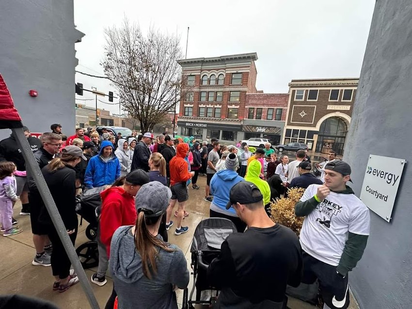 Pittsburg began a new Thanksgiving tradition as Turkey Trotters brave the rain and gather in the Evergy Courtyard at Fourth and Broadway, the start of a 5K run/walk on Thanksgiving morning.&nbsp;