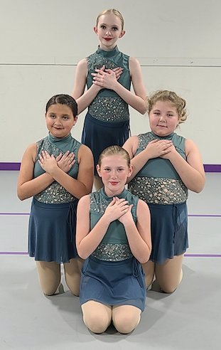 Clockwise from left: BTC Athletics and Dance dancers Brileigh Boyer, Lydia Grotheer, Becca Bradshaw, and Sophie Rudisill hold their final pose of their dance &ldquo;That&rsquo;s Christmas to Me&rdquo; for the upcoming holiday recital &ldquo;&lsquo;Twas the Night Before Christmas.&rdquo;