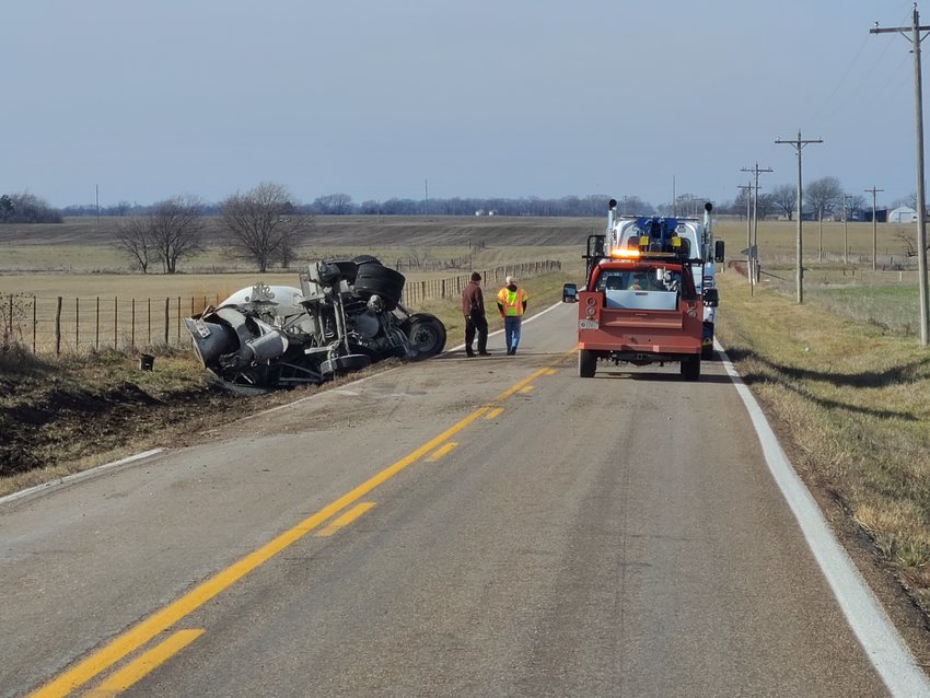 A cement truck was traveling westbound Friday morning on K-126 Highway when it ran off the right side of the road, the driver overcorrected, and the truck rolled into the south ditch near the intersection with 80th Street, according to the Kansas Highway Patrol.