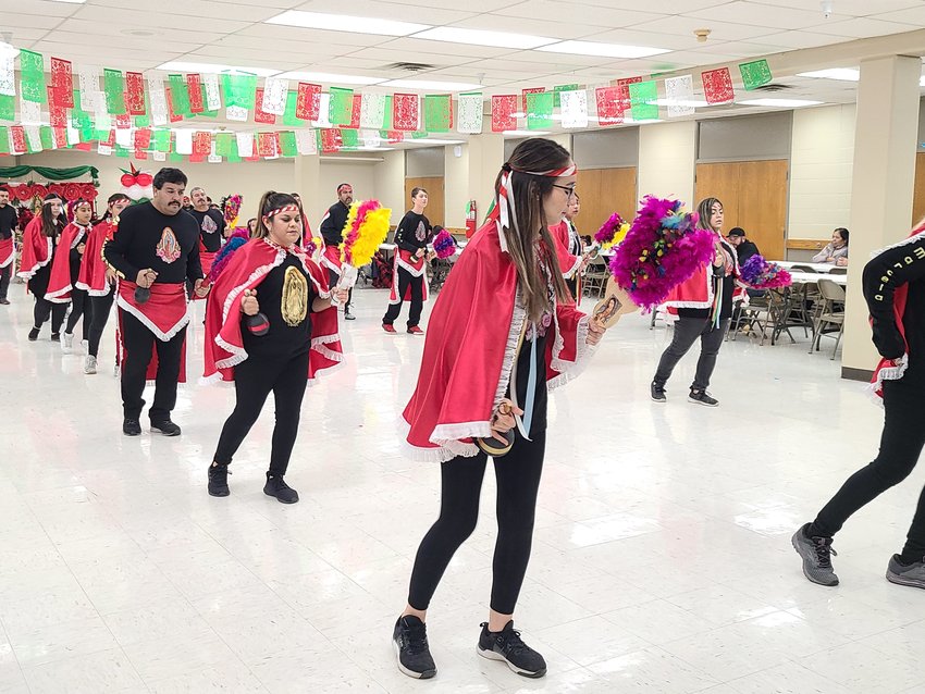 Several generations participated in the danza, or dance, to celebrate Our Lady Guadalupe that was hosted by the Hispanic ministry of Our Lady of Lourdes Catholic Church on Monday evening.