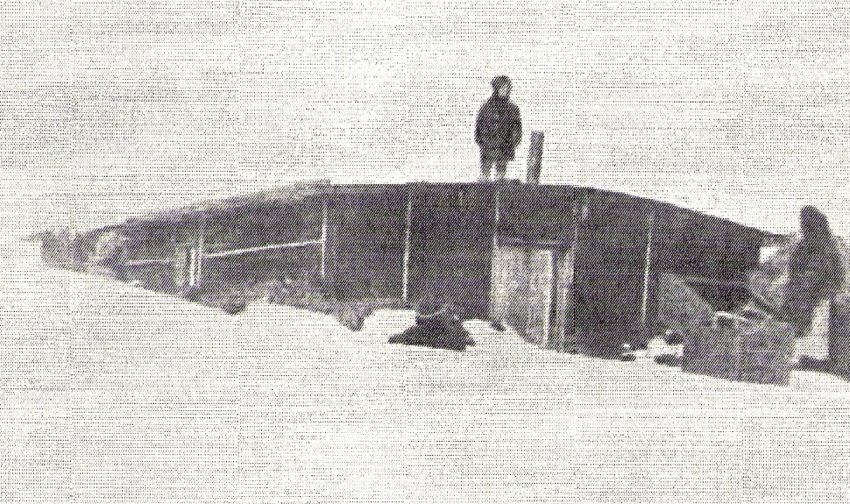 George Sharp standing atop half-dugout.