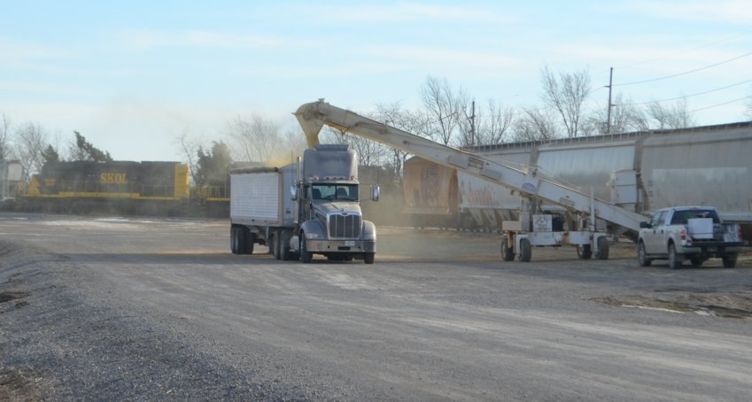 Grain trucks load up at Watco&rsquo;s new transload facility in Pittsburg before delivering to Diamond Pet Food in Frontenac&rsquo;s industrial park, saving thousands in transportation costs over past shipping methods.