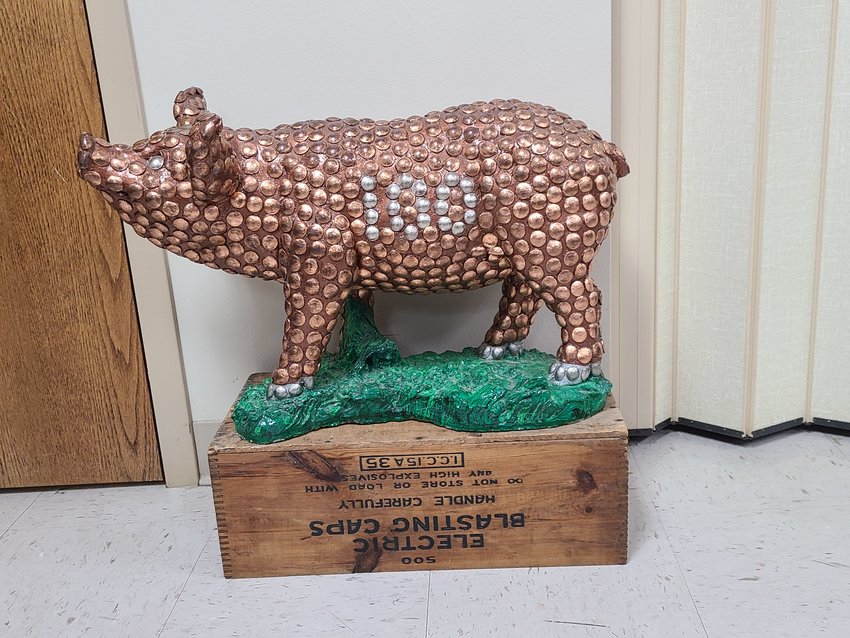 Abe, the CENTennial pig, is on display at Miners Hall Museum as part of the quarterly exhibit &ldquo;Of Money and Metals: Doing Business in the Mining Era.&rdquo;