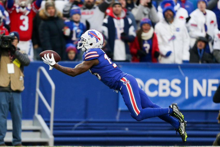 Buffalo wide receiver John Brown, former All-American at Pittsburg State, makes a diving touchdown reception during the Bills' 35-23 victory over New England on Sunday in Orchard Park, N.Y. After going to the sideline, Brown gave the football to the Bills' trainer who provided CPR to Damar Hamlin on Monday night in Cincinnati.