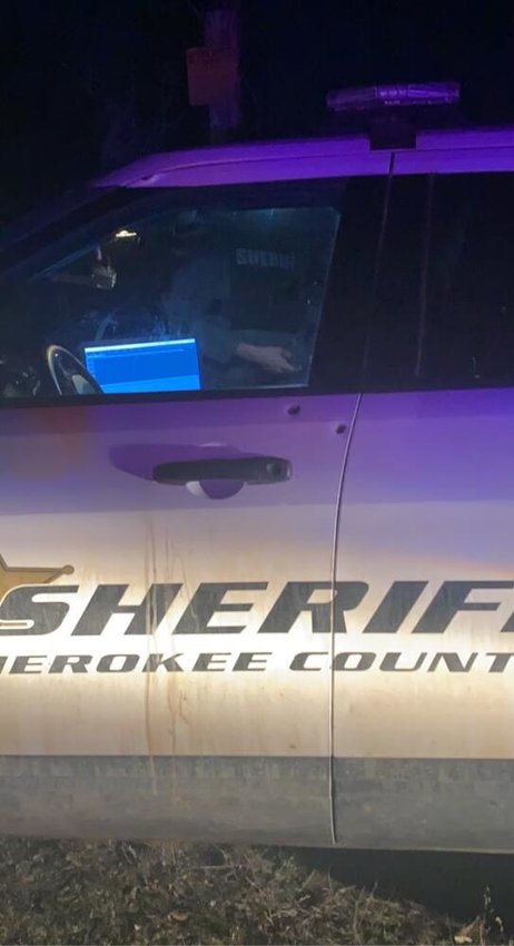 Multiple rounds allegedly fired by a suspect who later died of a self-inflicted gunshot wound hit a Cherokee County Sheriff&rsquo;s Office vehicle on Monday.