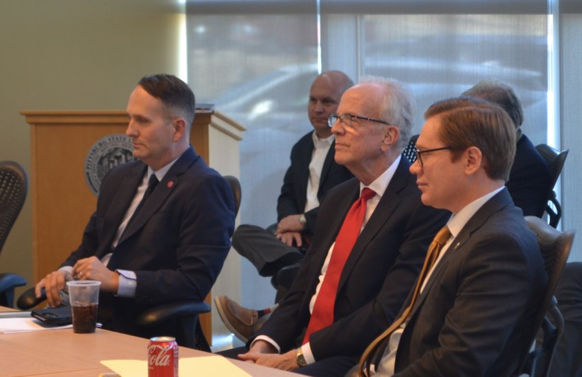 Front row, from left, Pittsburg State President Daniel Shipp, U.S. Sen. Jerry Moran, and Kansas Lt. Gov. David Toland listen to Dr. Sethuraman Panchanathan, director of the National Science Foundation, at the Tyler Research Center in Pittsburg, as he talks about the economic possibilities at the university.