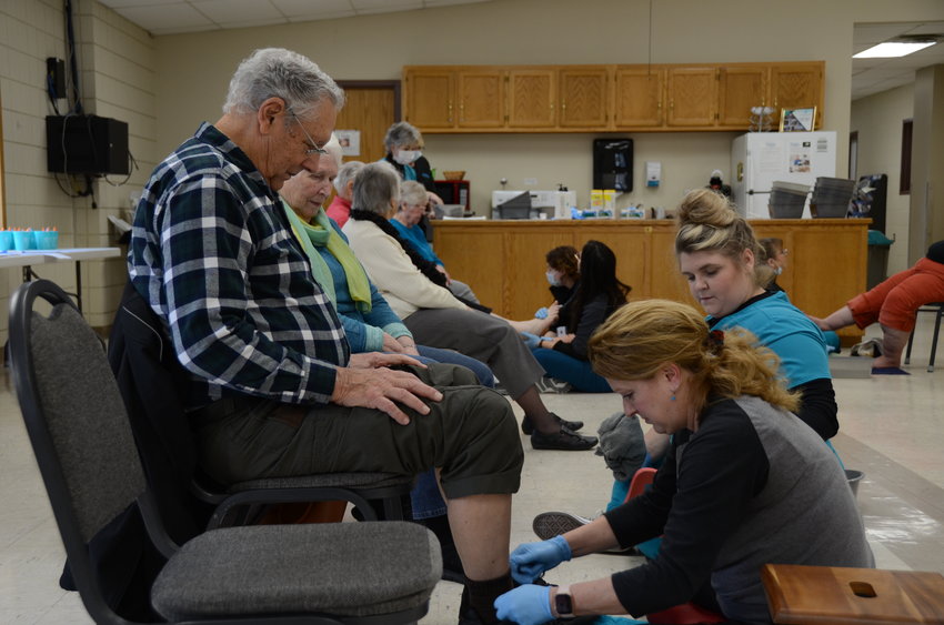 Over two dozen citizens attended the free Foot Care Clinic hosted by the Harry Hynes Memorial Hospice at the Homer Cole Center on Wednesday afternoon