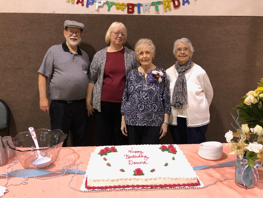 From left, Bill Holden, Cathy Holden, Donna Lyerla, and Melissa McCool pose for the camera at Lyerla&rsquo;s 90th birthday celebration at PittNaz Church on Saturday, Jan. 21.