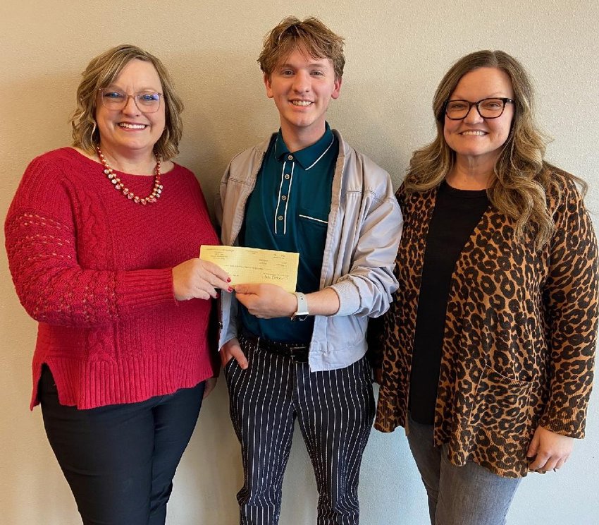 Peyton Simpson, center, a 2021 LCC graduate, was announced Tuesday as the winner of the Labette Community College 100-year logo design contest.