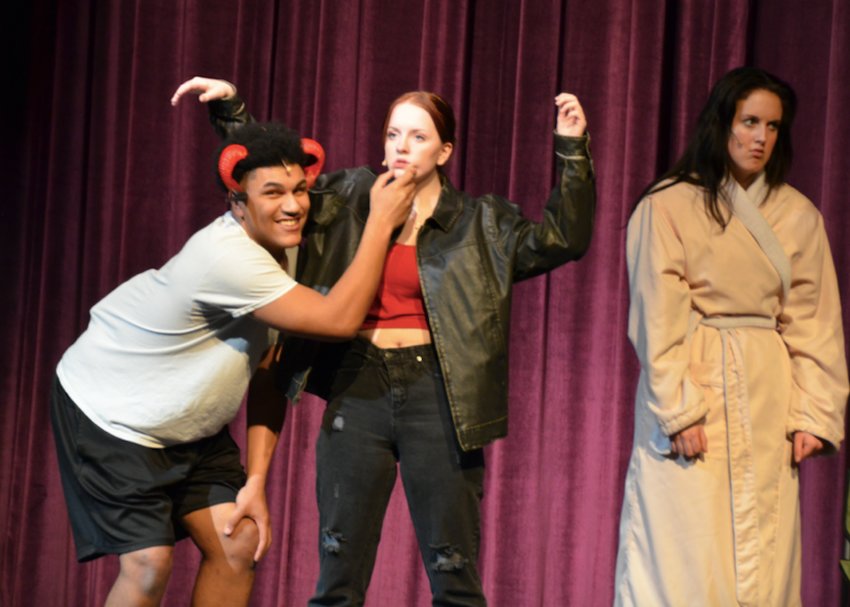 From left, PHS students Will Williams, playing Dave, makes Alex Muckala, playing Jenna, mouth silly things after making her freeze, while Lauren Coomes, playing Paris rolls her eyes in the show &ldquo;Dave.&rdquo;