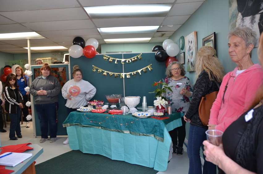 Many supporters and volunteers filled the new Pawprints on the Heartland facility during the organization&rsquo;s open house on Sunday. Pawprints provided refreshments and information about their services at the event.