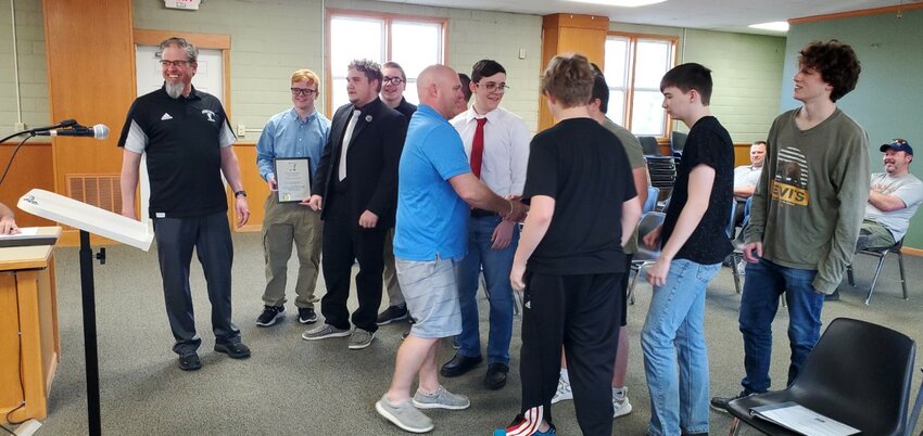 Frontenac Mayor David Fornelli congratulates Frontenac High School Chess Team members on their second consecutive state title as Frontenac chess coach Dan Eckstein looks on. &ldquo;Apparently, we&rsquo;re good at chess too,&rdquo; Fornelli said during his remarks.