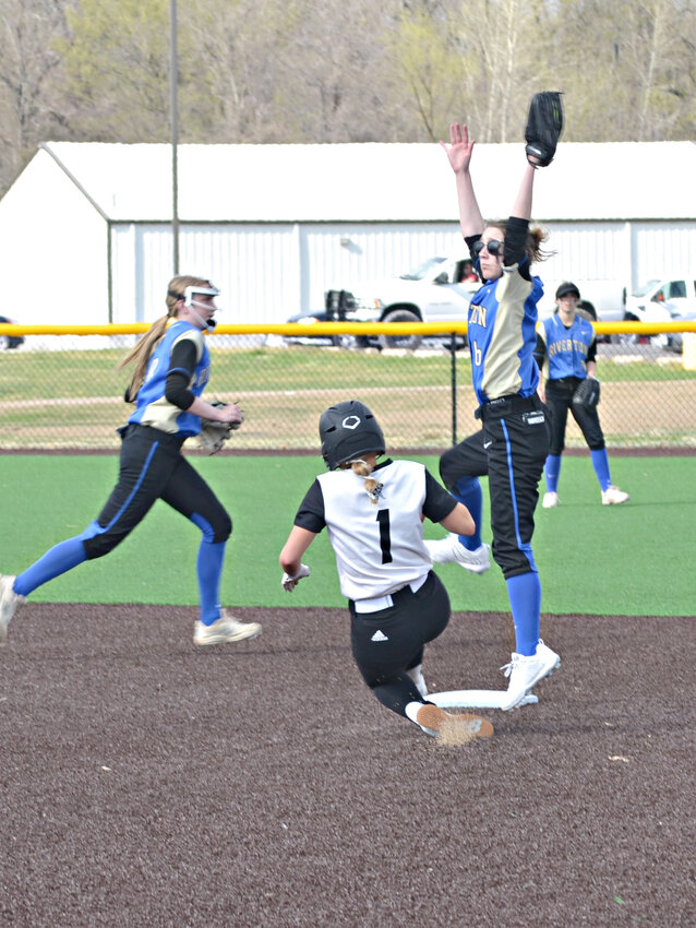 Frontenac's Mia Brown Slides Into Second During Monday's Contest Against Riverton in Frontenac.