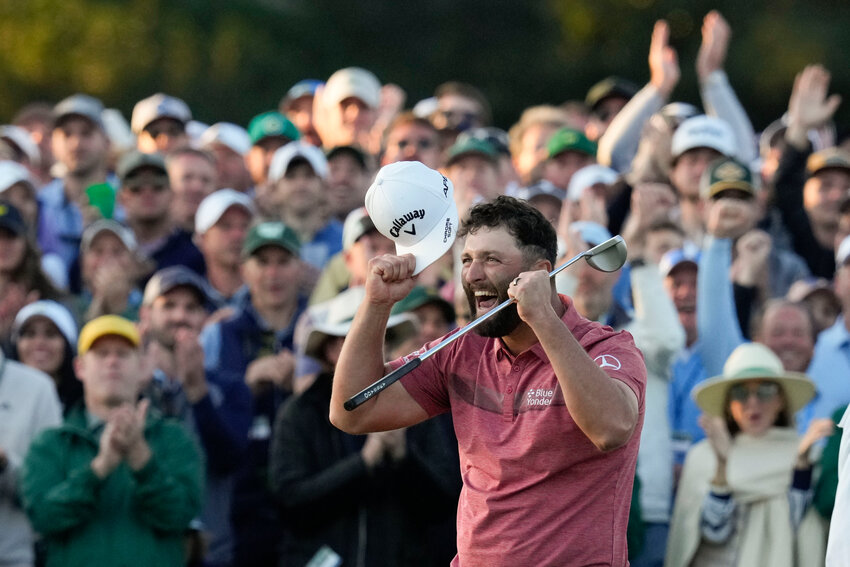 Jon Rahm of Spain celebrates on the 18th green after winning the Masters on Sunday at Augusta National Golf Club  in Augusta, Ga. (AP Photo/Mark Baker)