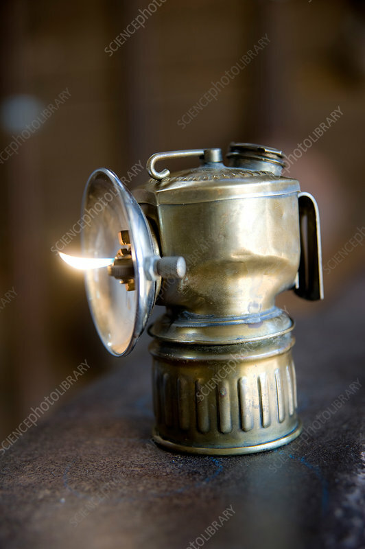 Calcium carbide is used in carbide lamps, in which water drips on the carbide and the acetylene formed is ignited. These lamps were usable but dangerous in coal mines, where the presence of the flammable gas methane made them a serious hazard. The presence of flammable gases in coal mines led to the miner safety lamp. However, carbide lamps were used extensively in slate, copper and tin mines, but most have now been replaced by electric lamps.