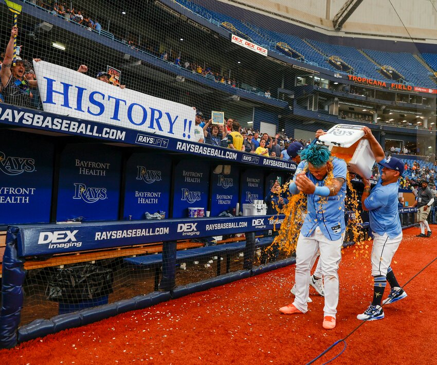 Tampa Bay Rays designated hitter Harold Ramirez is doused by teammates Jose Siri and Manny Navarro after defeating the Boston Red Sox on Thursday in St. Petersburg, Fla. (Ivy Ceballo/Tampa Bay Times via AP)