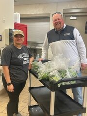 Leafy Green Farms Executive Vice President CJ Badart makes a delivery of greens to The Lord&rsquo;s Diner.