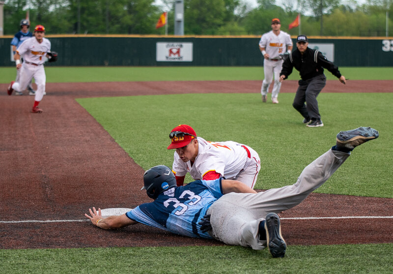 Pittsburg State third baseman Daegan Brady tags out Washburn's Ike Book to end the top of the first inning of their baseball game Friday night at Al Ortolani Field. COURTESY KAT BAILEY / PSU DEPARTMENT OF COMMUNICATIONS
