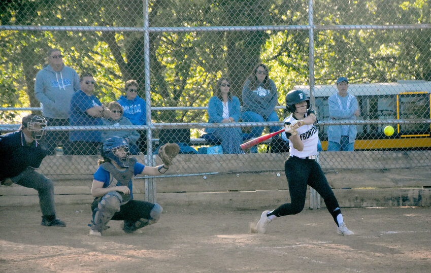 Frontenac's Avery Johnson belts a double to center field against St. Mary's Colgan on Tuesday in Pittsburg.