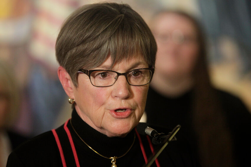 Kansas Gov. Laura Kelly speaks to reporters during a news conference, Tuesday, April 25, 2023, at the Statehouse in Topeka, Kan. Kelly and legislative leaders were required by law to sign off on a legal settlement between the state and a fitness studio owner whose business was forced to shut down in the early months of the coronavirus pandemic.