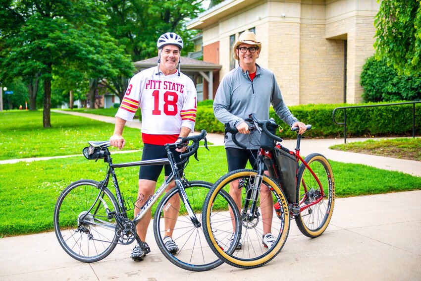 Pittsburg State University alumnus Bob McNellis (left) joined president Dan Shipp (right) during Day 2 of the &quot;Dan Bikes Kansas&quot; campaign. Donning a Pitt State football jersey, McNellis rode with Shipp from Iola to Lawrence via the Prairie Spirit Trail. &quot;Dan Bikes Kansas&quot; will take Shipp across 800 miles of Kansas over the course of 12 days. The goal of the campaign is to raise $8 million in student scholarships, as well as give Shipp the chance to connect with Kansans across the state.