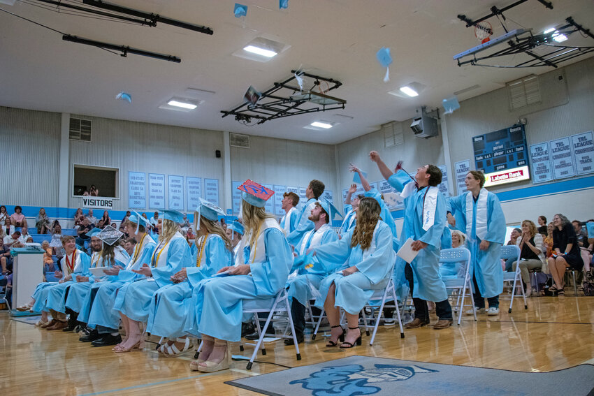 Members of the graduating class of 2023 at Southeast High School toss their caps into the air at the conclusion of the commencement ceremony Saturday, May 6 in Cherokee. Photos from the ceremony can be purchased online at https://fastactionphotography.zenfolio.com/p836174061?fpciidx=152
