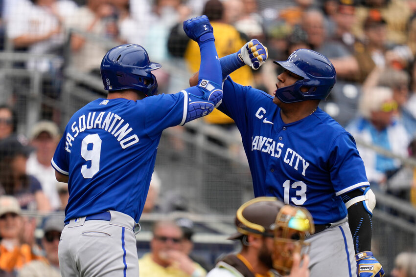 Kansas City Royals' Vinnie Pasquantino celebrates with teammate Salvador Perez after hitting a two-run home run during the sixth inning of Wednesday's game in San Diego. (AP Photo/Gregory Bull)