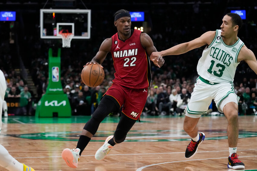 Miami forward Jimmy Butler drives to the basket against Boston guard Malcolm Brogdon in Wednesday night's Game 1 of the NBA basketball Eastern Conference finals playoff series in Boston. (AP Photo/Charles Krupa)