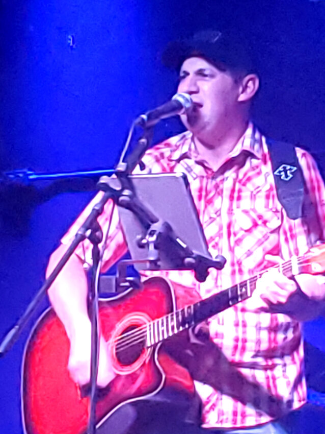 Dustin Treiber played original and cover songs of different genres Saturday night at The Pitt. The Rotary event was to support The Lord's Dinner.