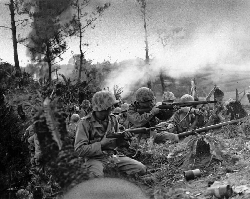 Marines return fire near Naha, Okinawa. One of the most vicious battle of the Pacific, the US suffered 50,000 casualties, 12,500 being fatalities. The Japanese Army lost more than 77,000 dead. But the Okinawan civilians suffered far worse, with 140,000 lost.