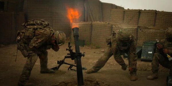 A modern-day M-252 81mm mortar in action in Afghanistan. First developed during World War I, Stokes-style mortar systems have provided infantry battalions with quick-firing, man-portable, light artillery.