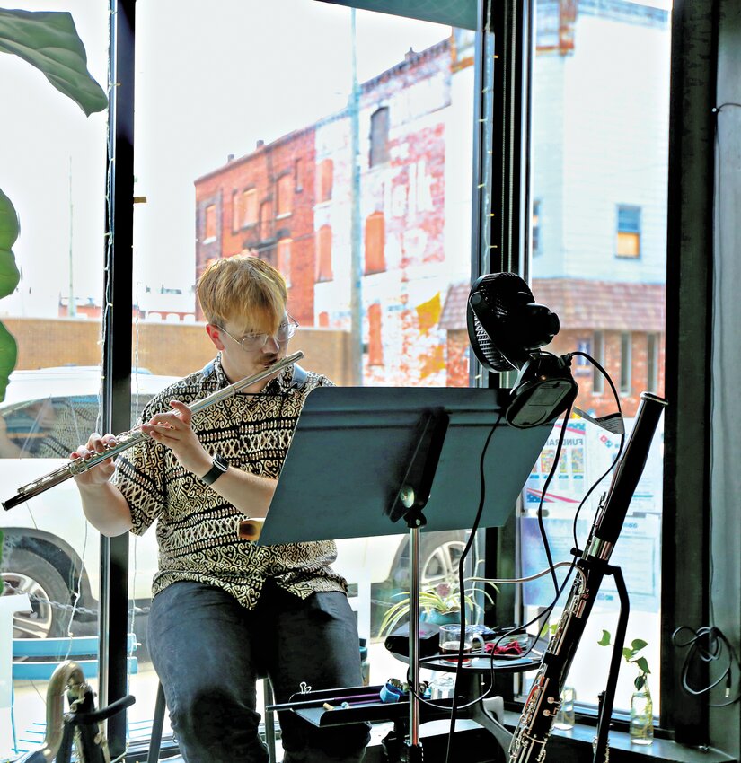 Woodwind specialist and Pittsburg State University graduate Colton Sprenkle performs &ldquo;Six Metamorphoses after Ovid&rdquo; by Benjamin Britten on Thursday for an audience at TOAST on the fifth day of the Pittsburg Festival of the Arts. The multi-instrument specialist performed several other pieces with the flute, clarinet, oboe and bassoon.