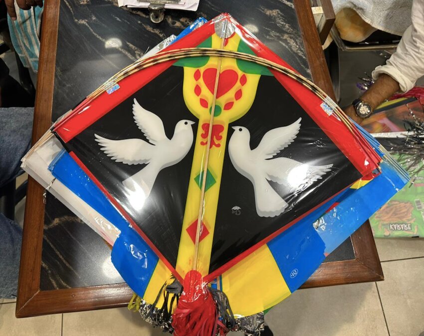 Examples of Indian kites being flown in for a festival at Pittsburg High School on July 1. Each kite is hand-made and painted and will be given to any children who attend the festival.