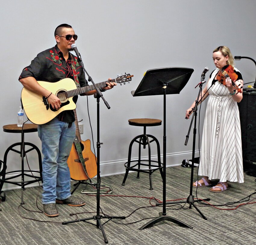 Seth Horn and Meg McCoy of Blood Moon Roses performed in the morning and afternoon during the KCAIC Regional Arts Meetup, held at Block22 on Friday.