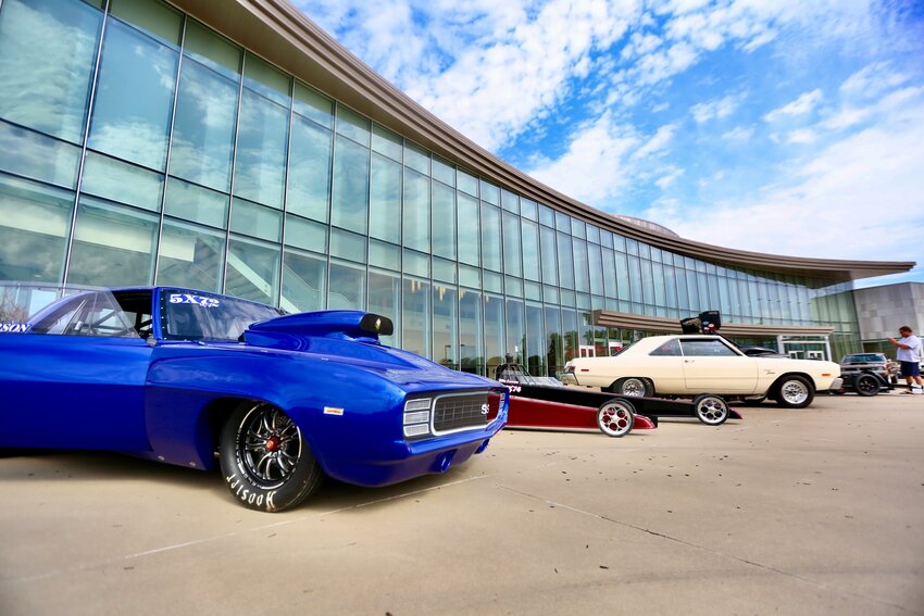 Dragsters, funny cars and muscle cars lined up in front of the Bicknell Family Center for the Arts Thursday evening during the &ldquo;Full Throttle in Print&rdquo; event and exhibit.