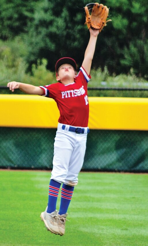 Pittsburg 12U second baseman Mason O&rsquo;Brien leaps for the ball during Monday&rsquo;s Midwest Regional elimination game against Kearney (Nebraska) in Whitestown, Indiana.