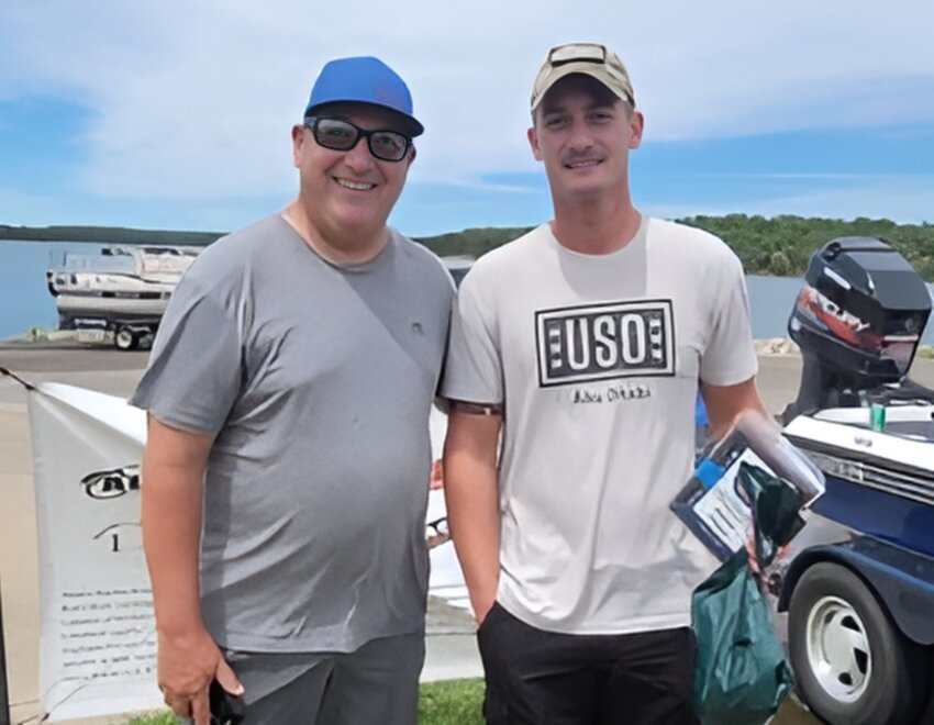 Bryan Fahler (left) and Austin Windle claimed first-place honors in the American Bass Anglers District 58 &ldquo;Take an Airman Fishing&rdquo; tournament on Aug. 5 at Big Hill Lake.