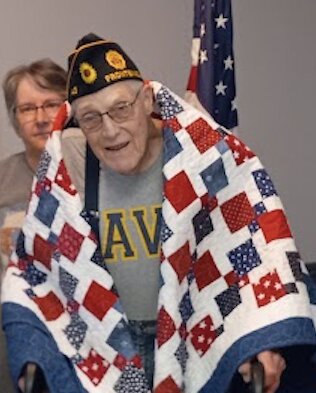 A.O. Brown of Frontenac received his Quilt of Valor Wednesday night at the John F. Derby American Legion Post 43 in Frontenac. Brown served aboard a minesweeper in the Pacific from 1954 to 1957.