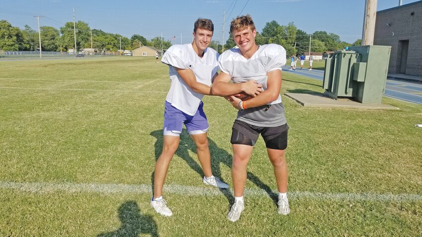 Tucker Harrell (left) has been handing off to Cooper Simmons for many years. Both had big games last week to begin their senior seasons at St. Mary&rsquo;s Colgan.
