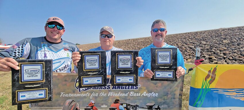 Kyle Kiister, John Vanderpool and Mike Butcher (left to right) won the top prizes last weekend at the District 58 Championship on Big Hill Lake.