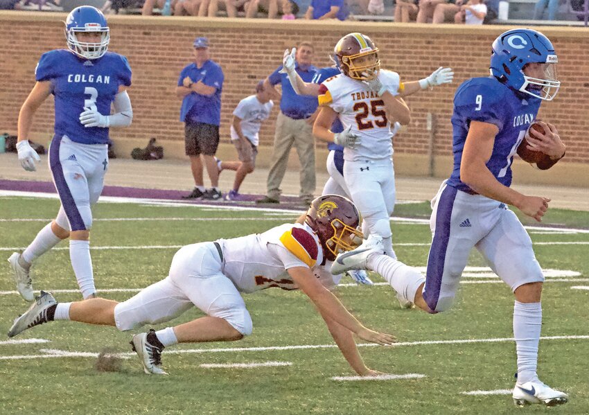 St. Mary&rsquo;s Colgan senior quarterback Tucker Harrell beats the last defender for a touchdown run during Colgan&rsquo;s 47-8 victory over Girard on Sept. 7 at Hutchinson Field.