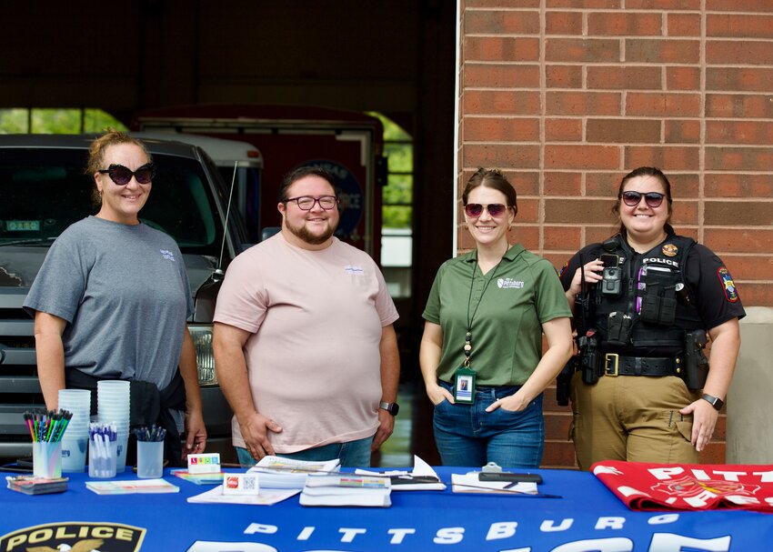 From left: Pittsburg Police Department Family Response Advocate Diann Gambill, Family Response Advocate Teddy Laubengayer, Administrative Assistant Jacquelyn Eighmy and police officer Alexandria Tippie gather together prior to Friday&rsquo;s free car seat checks for the community at Fire Station 1.