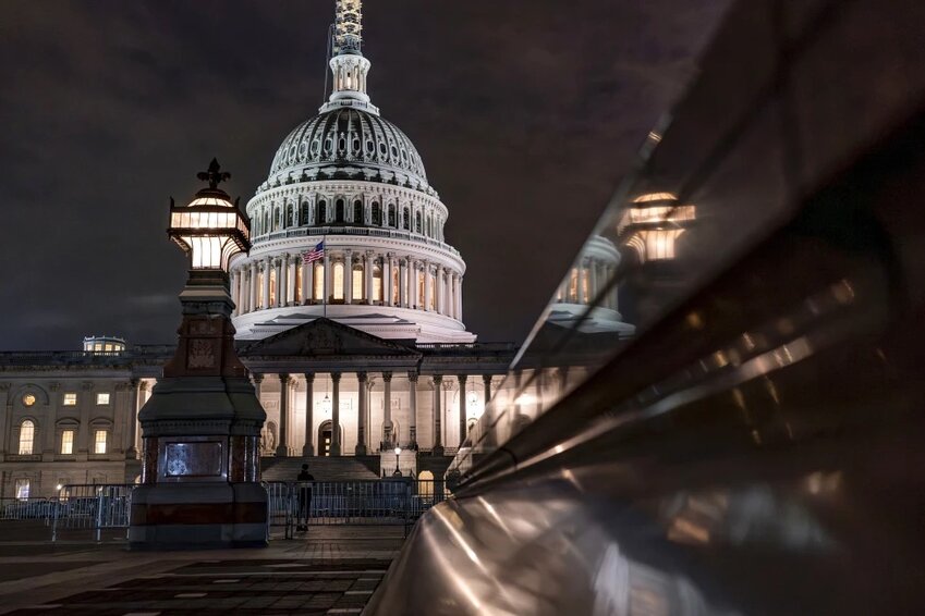 The Capitol is seen late Tuesday night, Sept. 26, in Washington, as lawmakers work to advance appropriations bills on the House floor. The Republican-controlled House and the Democrat-controlled Senate are starkly divided over very different paths to preventing a federal shutdown.