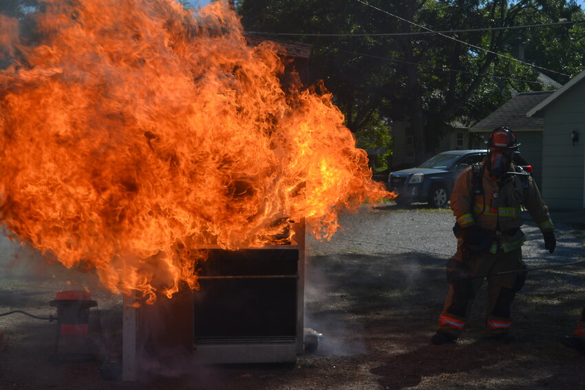 Pittsburg firefighters demonstrate the danger of using water to put out a grease fire. This fireball was the result of using less than a cup of water. Firefighters recommend covering the grease and removing it from the heat source before calling 9-1-1.&nbsp;