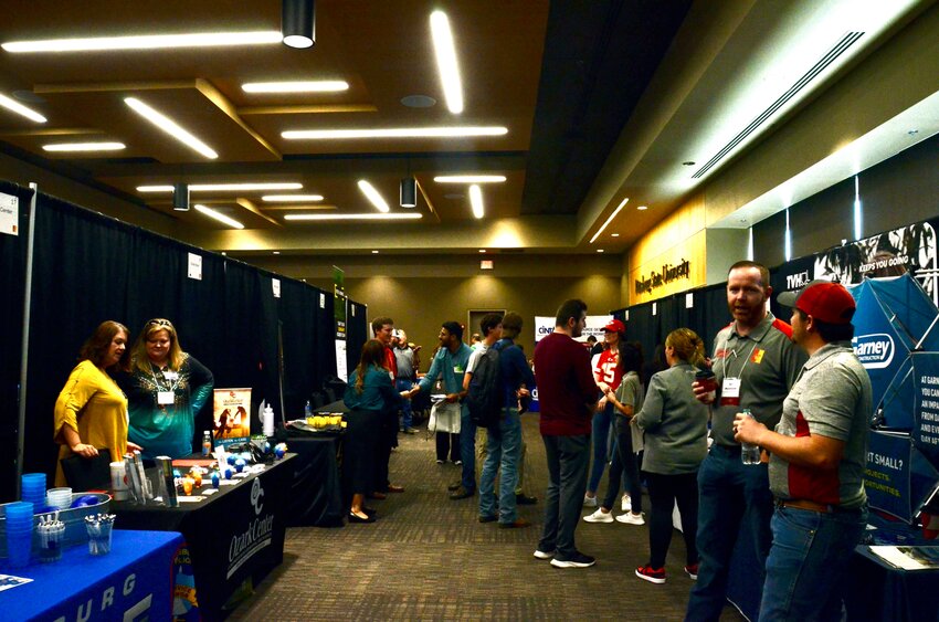 Students at Pittsburg State University peruse through the Crimson and Gold Ballrooms at the Overman Student Center to check out future career opportunities at this year&rsquo;s Fall Career Fair.